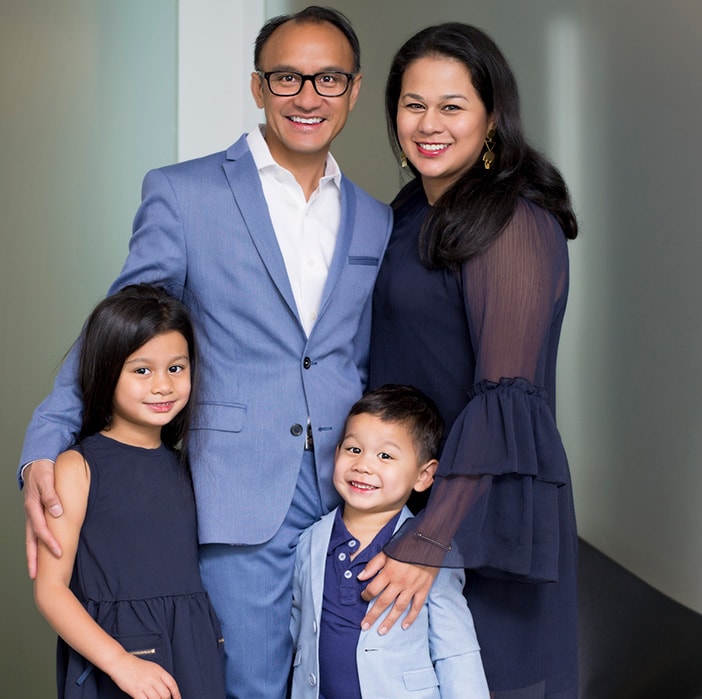 Photo of Dr. Paguio, his wife and his kids.