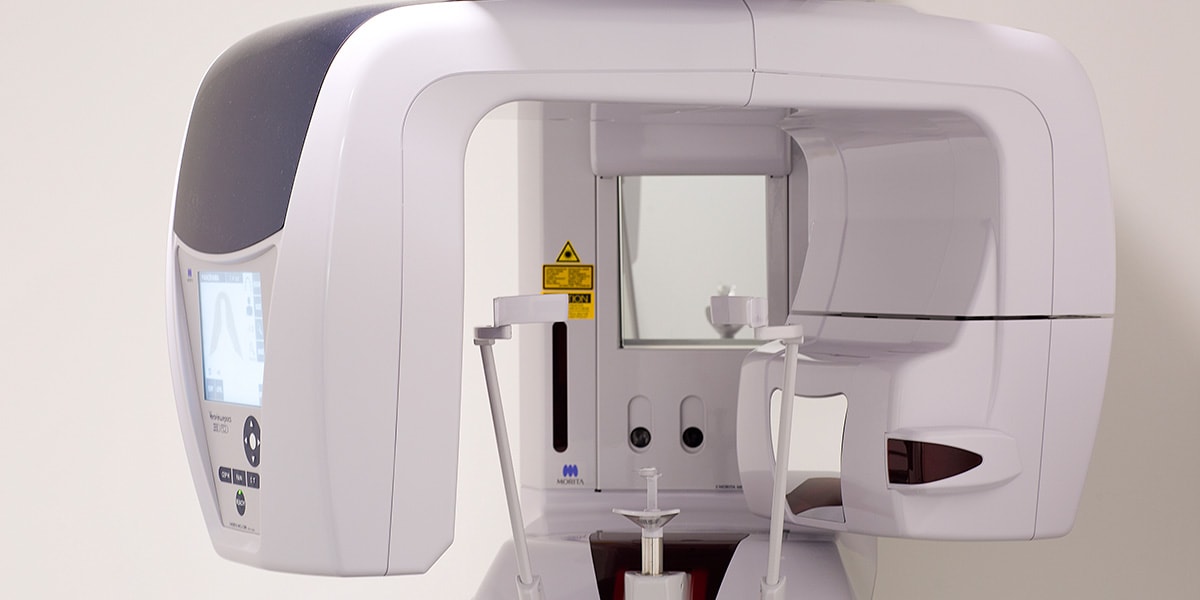 White modern dental imaging machine.